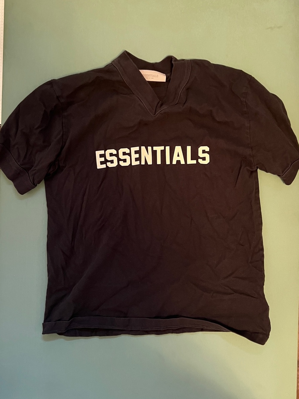 ESSENTIALS Men’s Black Logo Tee